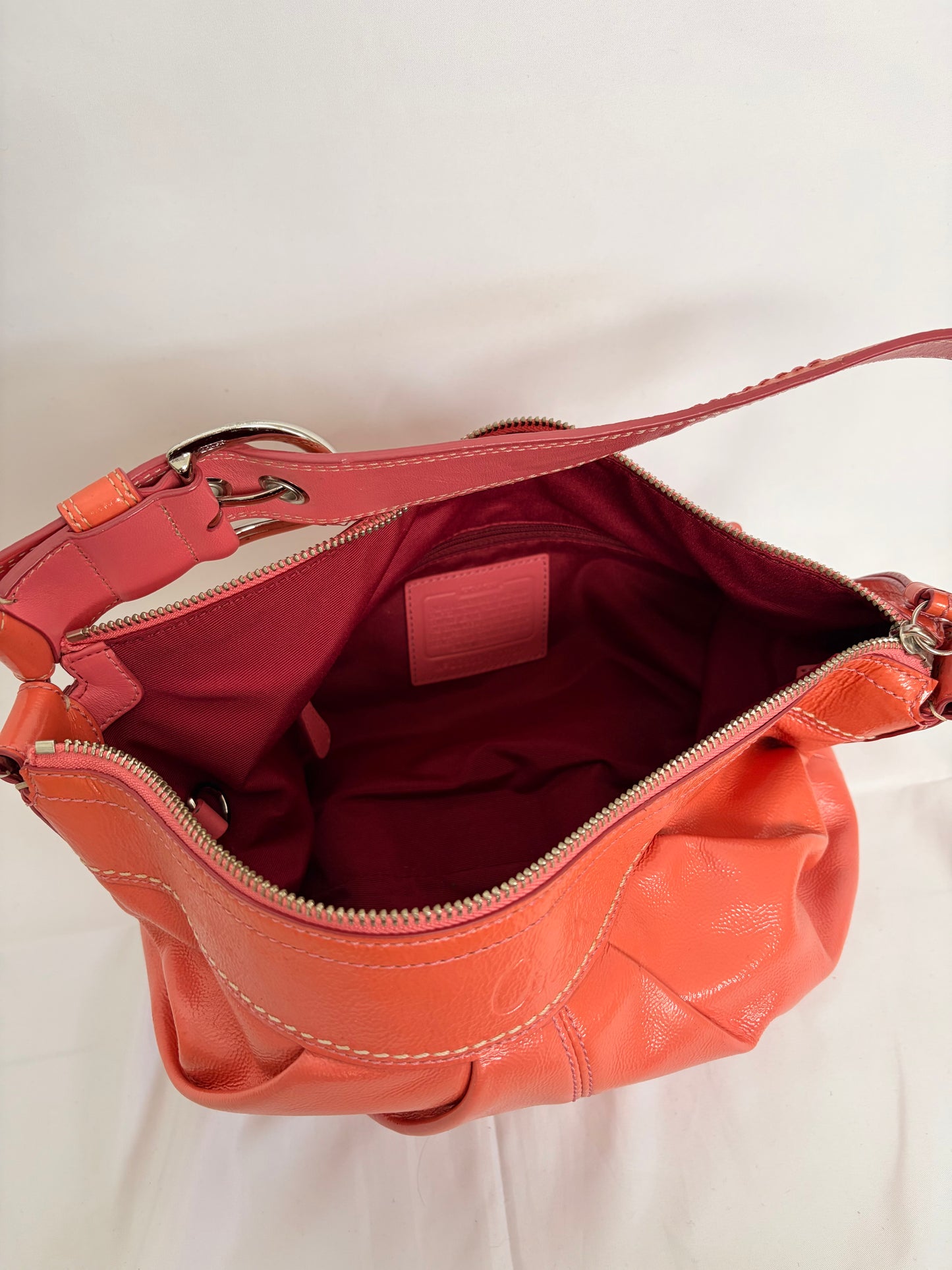 COACH coral pleated leather hobo handbag